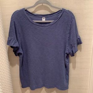 plain blue shirt w ruffled sleeve ends